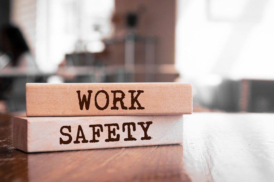 Wooden blocks with words ‘Work Safety’.